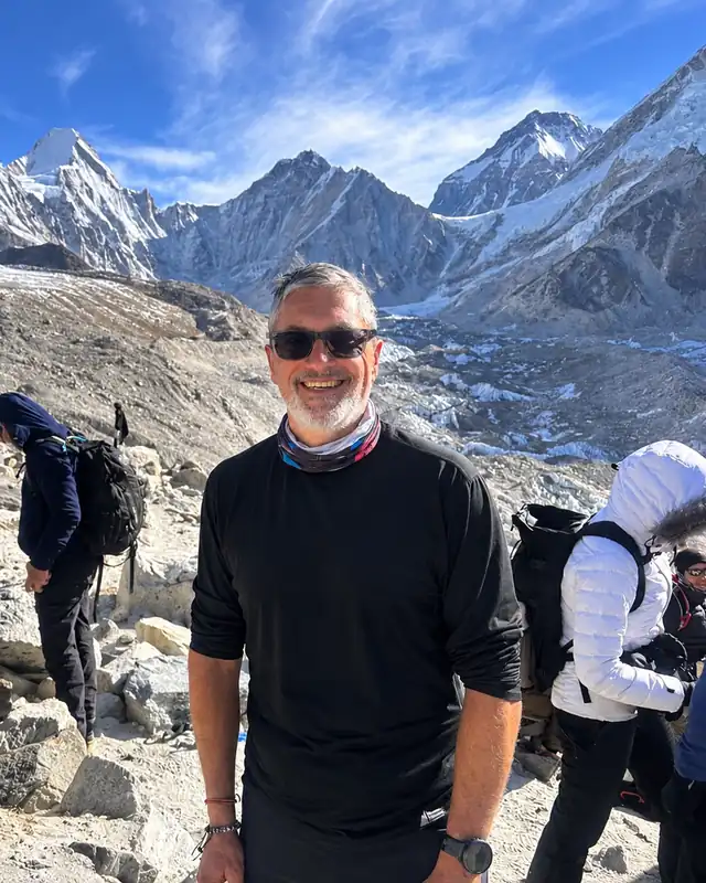 Sid smiling in the Himalayas near Everest